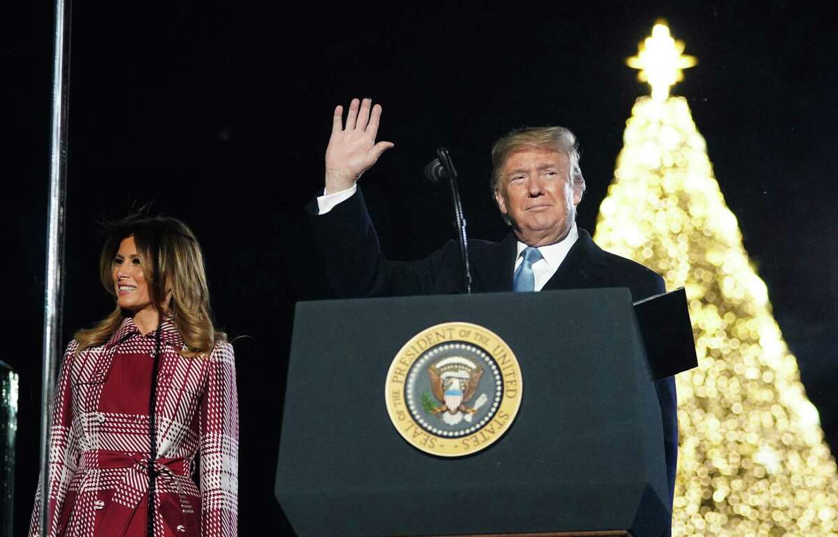 US President Donald Trump and First Lady Melania Trump take part in the annual lighting of the National Christmas tree on The Ellipse in Washington, DC on December 5, 2019. (Photo by MANDEL NGAN / AFP) (Photo by MANDEL NGAN/AFP via Getty Images)