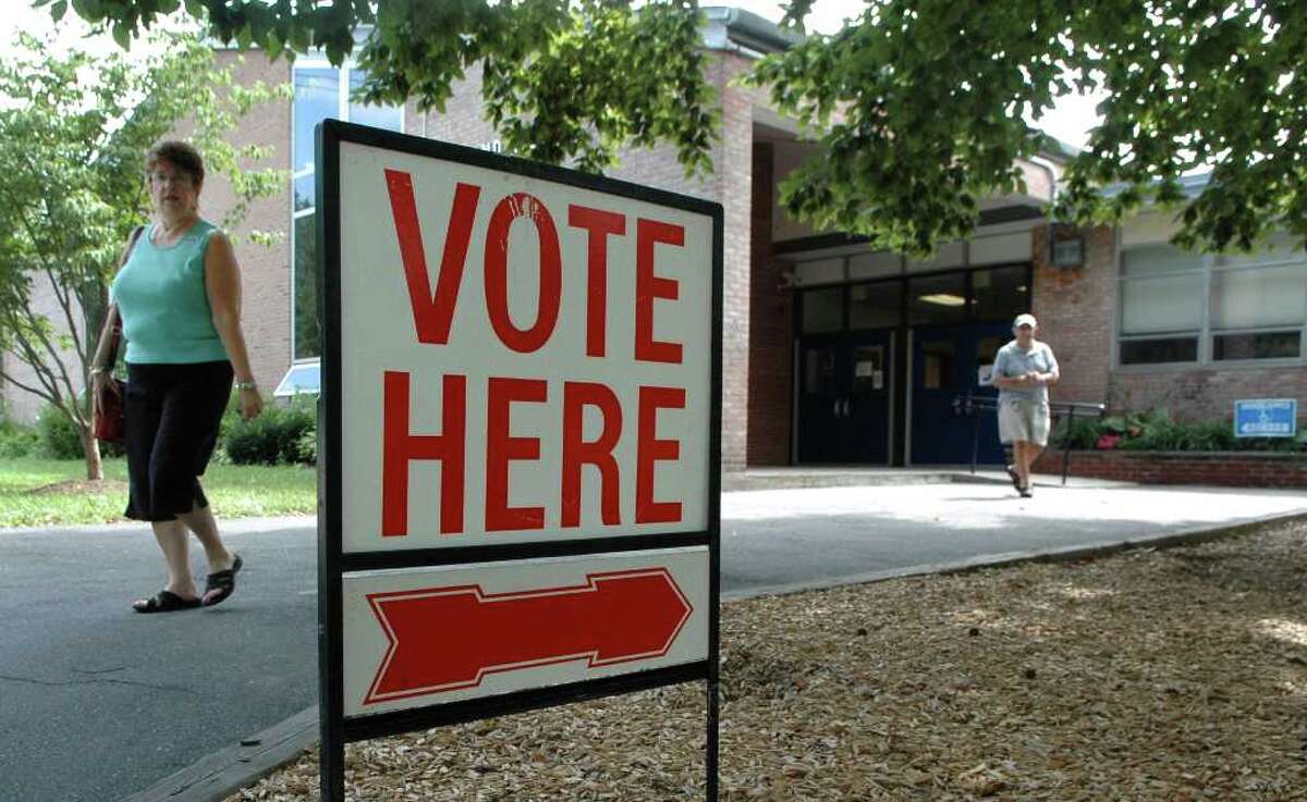 A slow trickle of voters arrive at Holland Hill School in Fairfield to cast their ballot for the candidate of their choice in the primary election on Tuesday August 10, 2010.