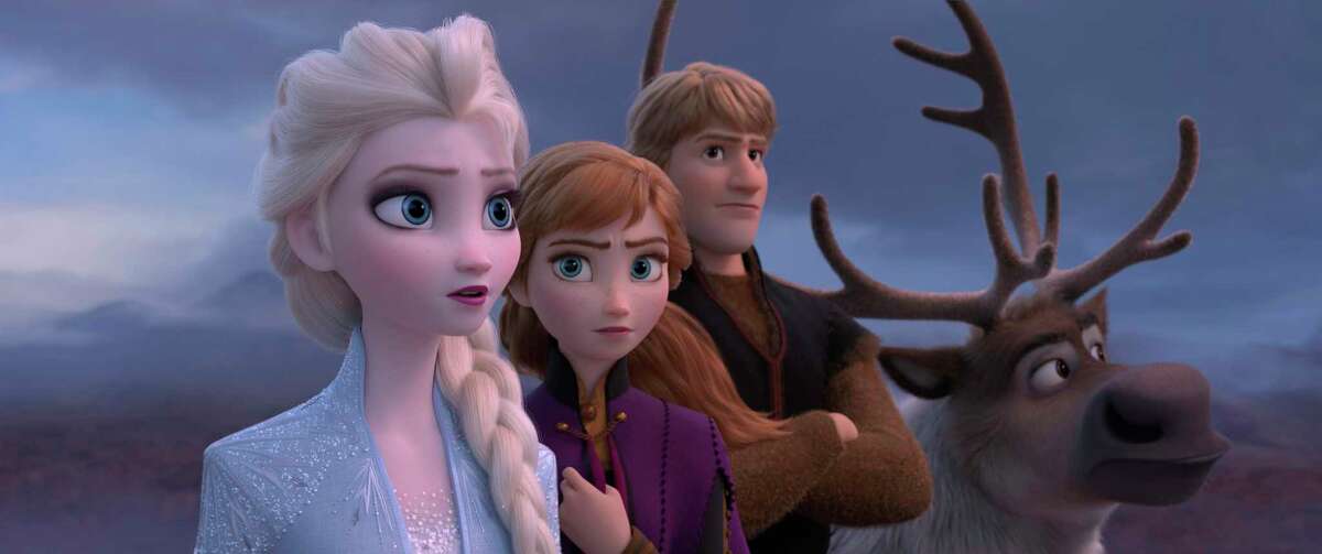 This image released by Disney shows Elsa, voiced by Idina Menzel, from left, Anna, voiced by Kristen Bell, Kristoff, voiced by Jonathan Groff and Sven in a scene from the animated film,