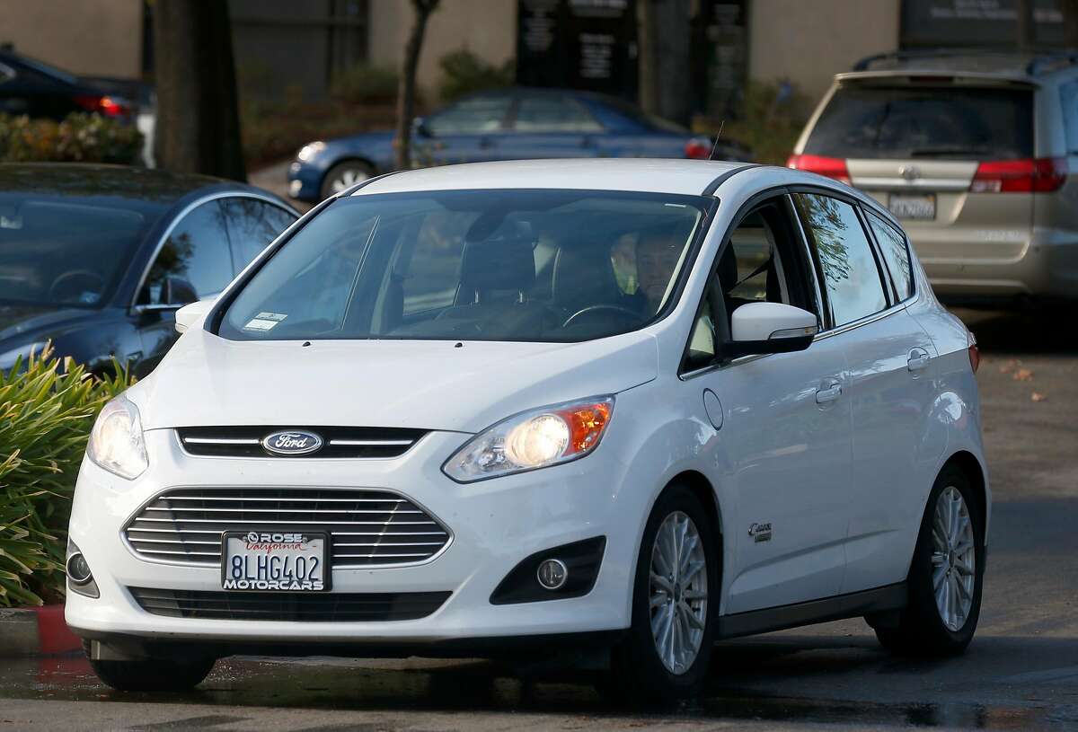 Ignacio Hernandez drives his 2016 Ford C-Max hybrid sedan in Dublin, Calif. on Tuesday, Dec. 3, 2019. Hernandez received a $9,500 stipend from the Bay Area Air Quality Management District after junking his 1996 Toyota Camry with over 264,000 miles.