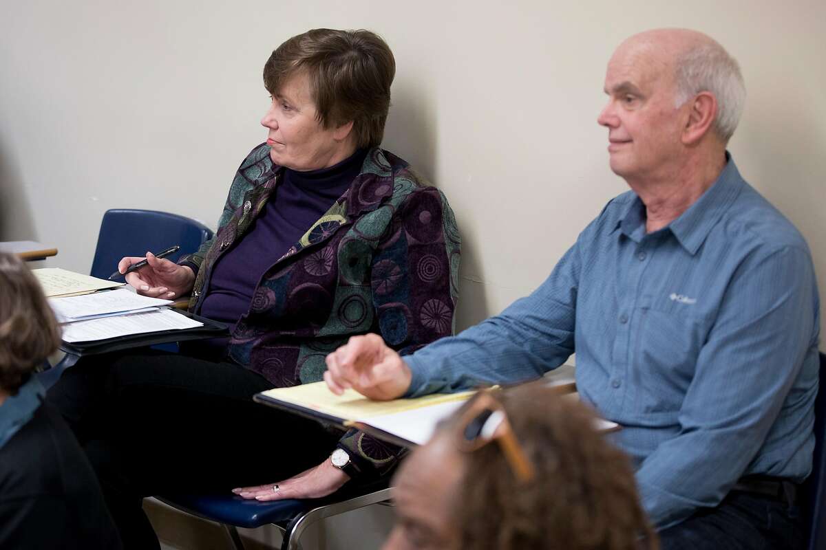 Lea Ann Fleming and Mike Fleming listen to a lecture during a Theater Elements and Interpretation class held at the City College of San Francisco Downtown Campus in San Francisco, Calif. Thursday, Dec. 6, 2019.