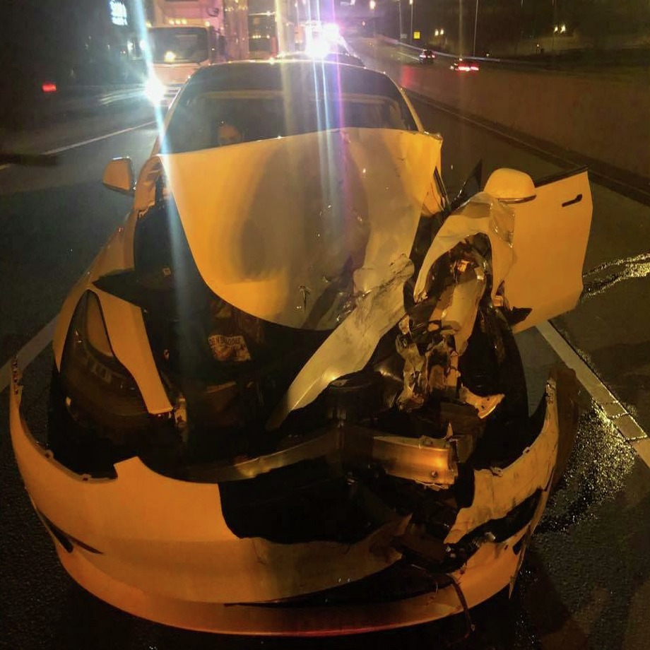 Photos from a collision on I-95 in Norwalk on Saturday, Dec. 7, in which a driver struck a police cruiser and a disabled vehicle with his Tesla, which he claimed was on auto-pilot, according to state police. Photo: Courtesy Of The CT State Police