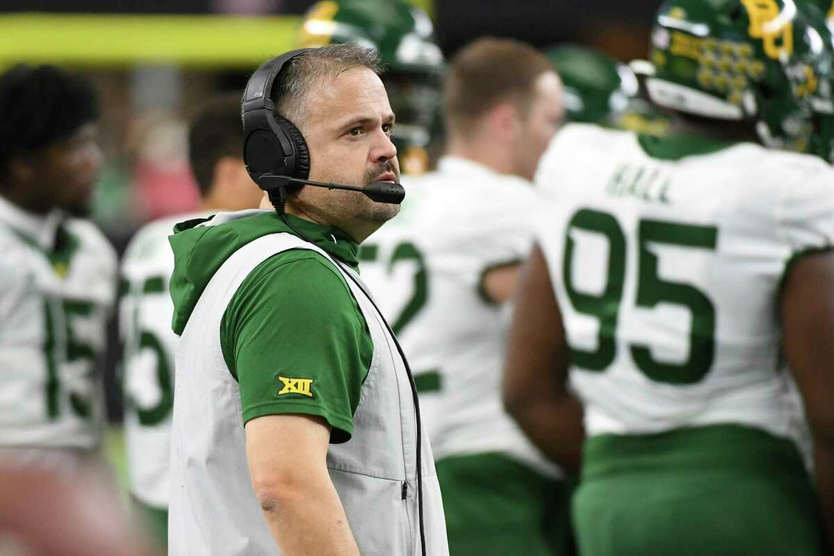 Baylor head coach Matt Rhule watches from the sidelines during a timeout in the first half of an NCAA college football game against Oklahoma for the Big 12 Conference championship, Saturday, Dec. 7, 2019, in Arlington, Texas. (AP Photo/Jeffrey McWhorter)