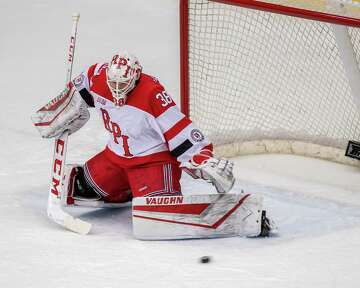 RPI goalie Alec Calvaruso makes a save against Brown University during a game at RPI in Troy, New York on Saturday, Dec. 7, 2019 (Jim Franco/Special to the Times Union.)