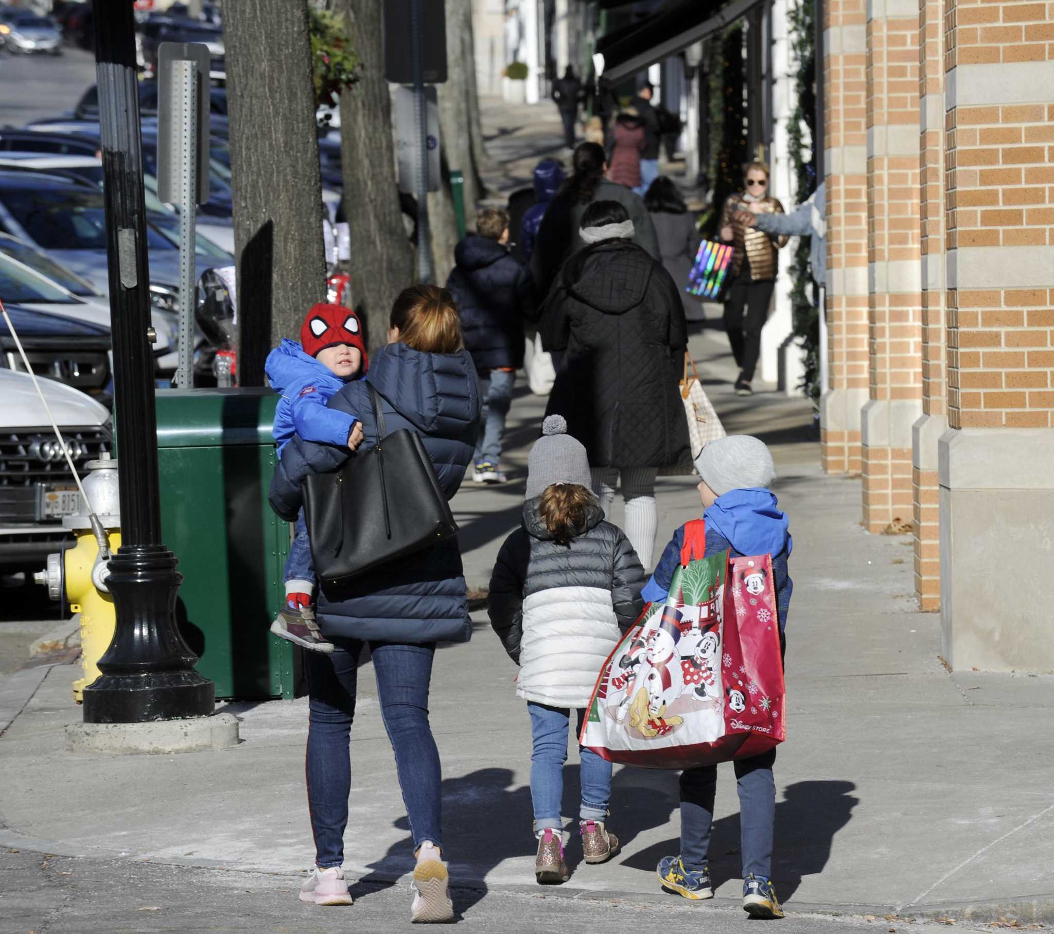 city sidewalk busy sidewalks dressed in holiday style Photos: Shoppers drop by the Greenwich Stroll back yard wedding