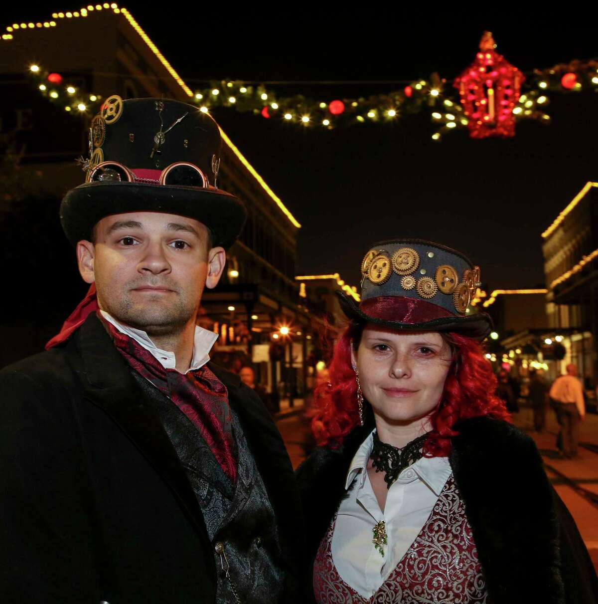 People attend the first day of the Dickens on The Strand Festival Friday, Dec. 6, 2019, in Galveston, Texas. The festival transforms the island’s historic Strand into the Victorian London of Charles Dickens.