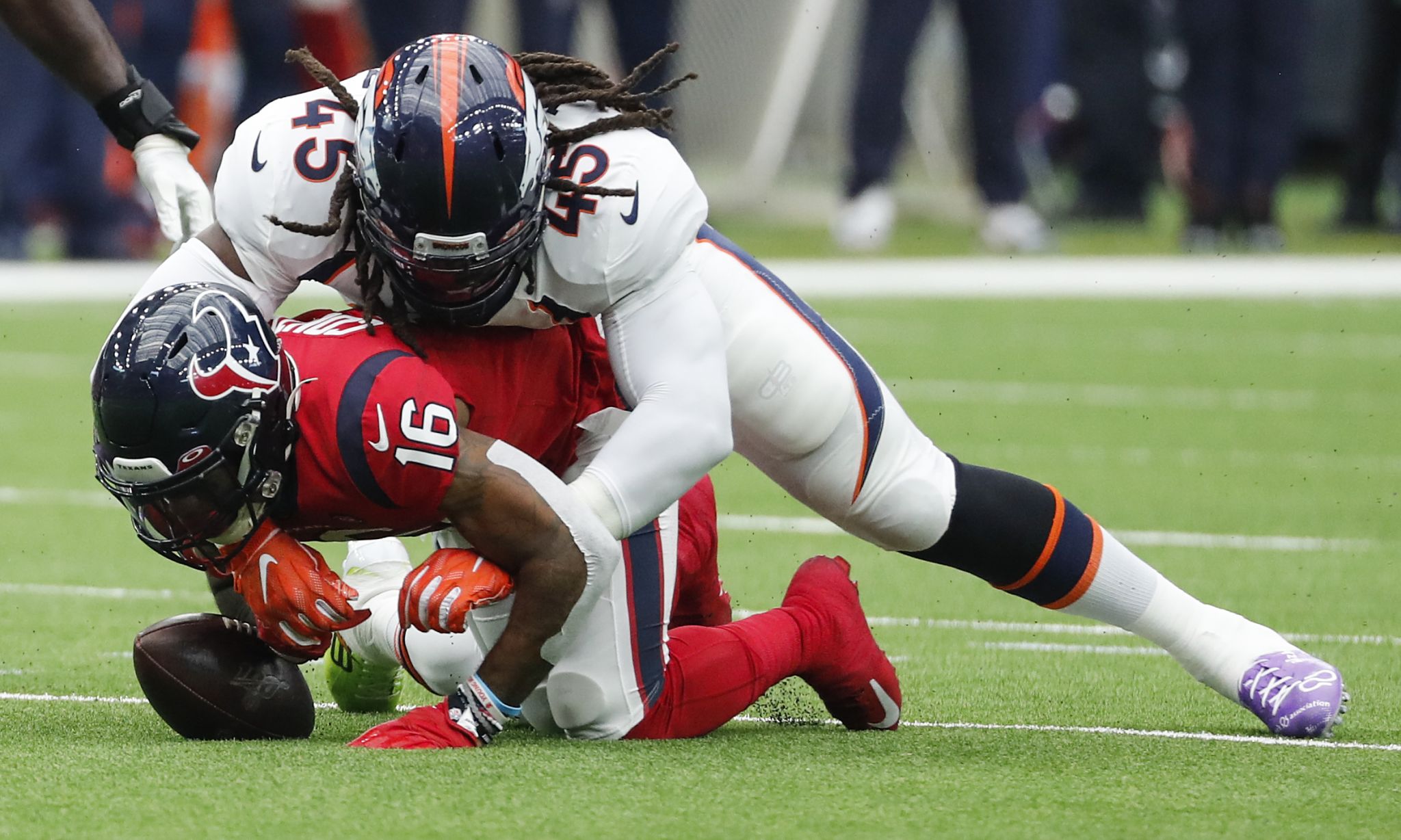 Houston, Texas, USA. 8th Dec, 2019. Denver Broncos linebacker Von Miller  (58) talks with Houston Texans running back Duke Johnson Jr. (25) after a  play during the NFL regular season game between