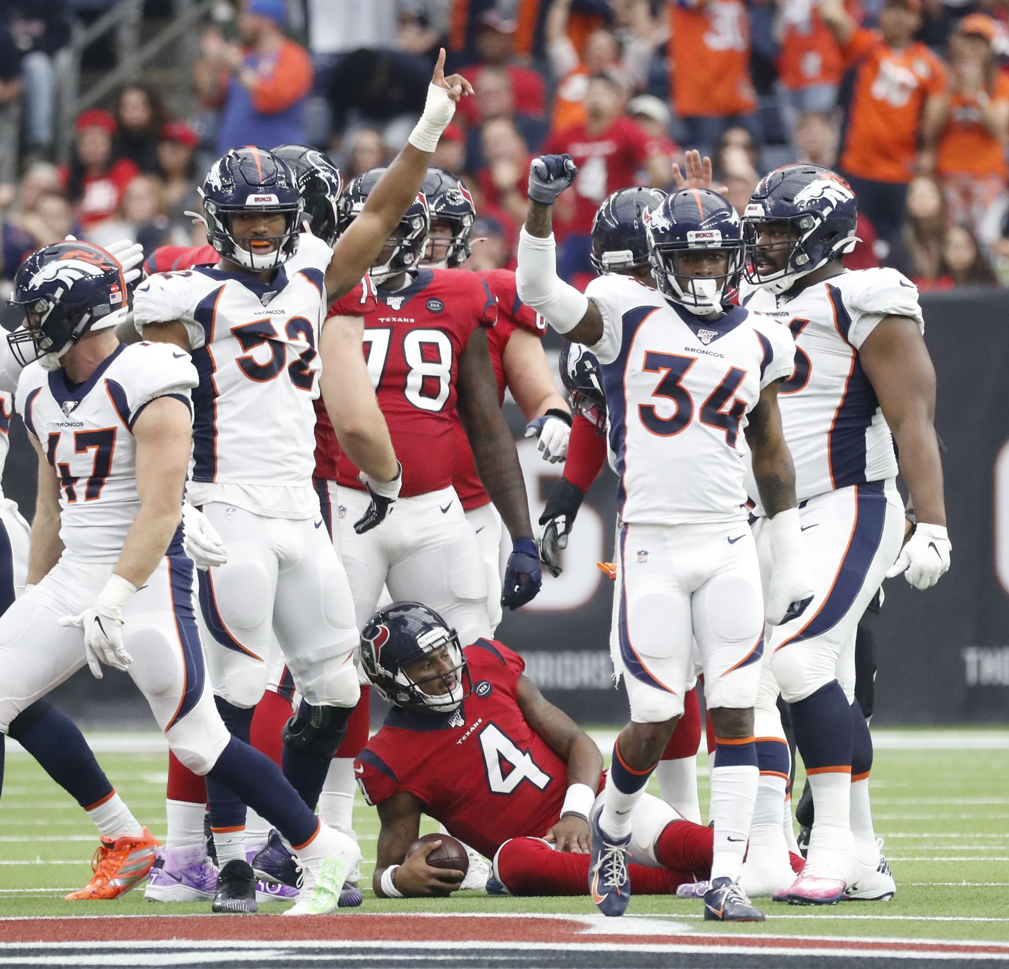 Houston, Texas, USA. 8th Dec, 2019. Denver Broncos linebacker Von Miller  (58) talks with Houston Texans running back Duke Johnson Jr. (25) after a  play during the NFL regular season game between