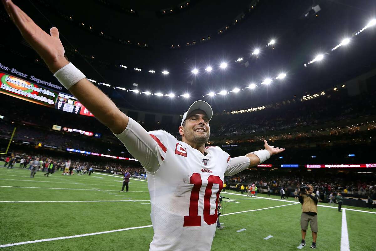 Jimmy Garoppolo #10 of the San Francisco 49ers celebrates a win over the New Orleans Saints after a game at the Mercedes Benz Superdome on December 08, 2019 in New Orleans, Louisiana. (Photo by Jonathan Bachman/Getty Images)
