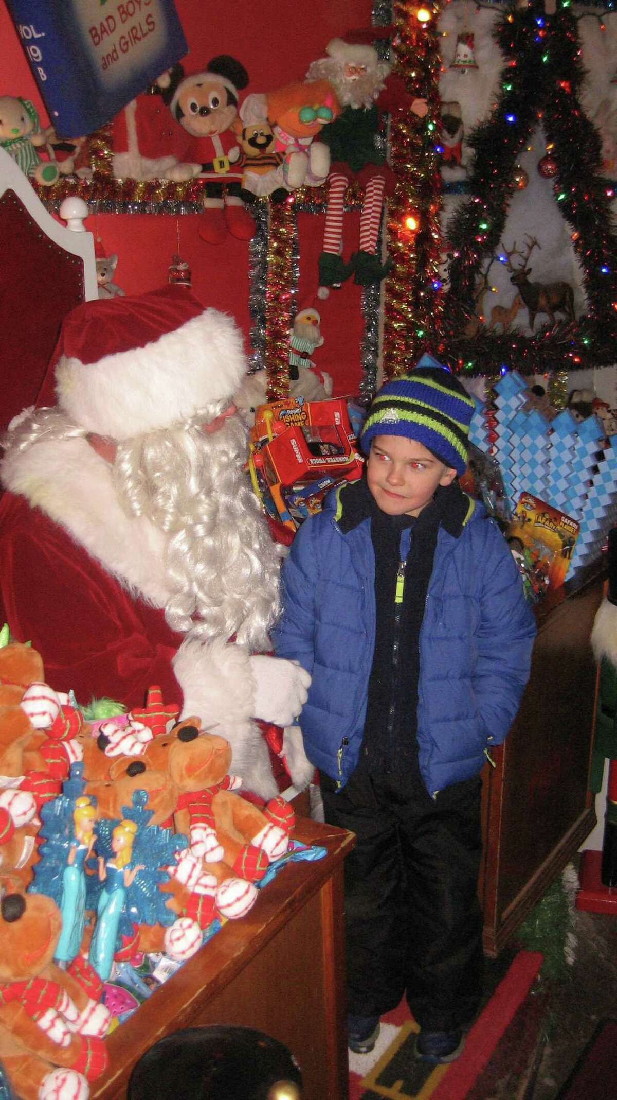 Torrington’s Christmas Village opens with parade, Santa’s arrival