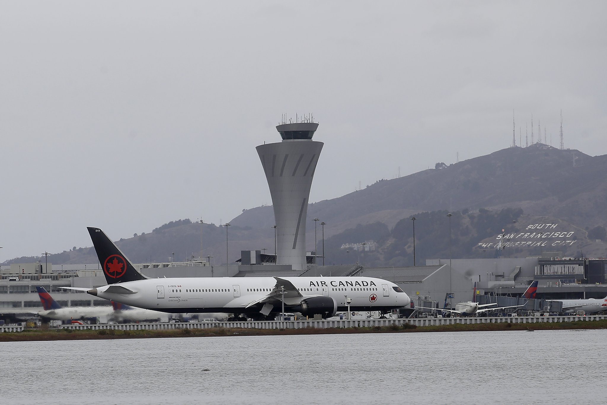 maximum liquid carry on airplane air canada