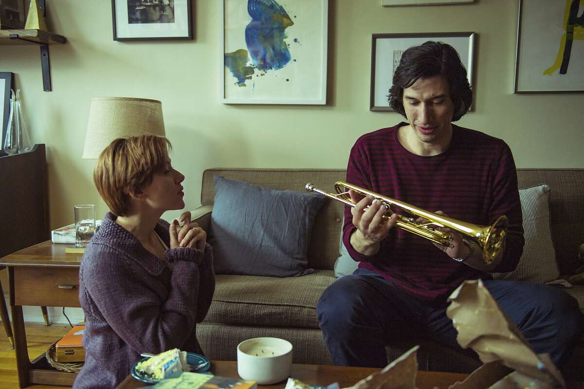 This image released by Netflix shows Scarlett Johansson, left, and Adam Driver in "Marriage Story." (Netflix via AP)
