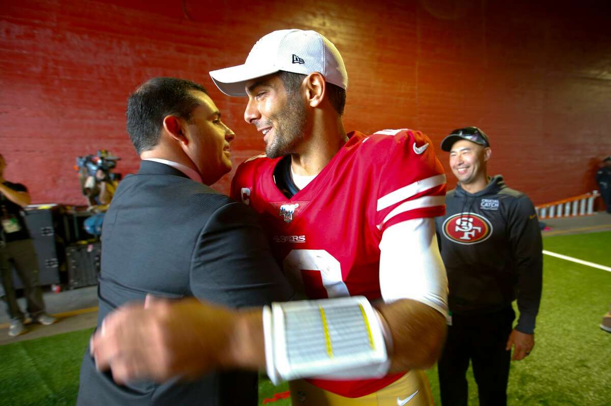 CEO Jed York and Jimmy Garoppolo #10 of the San Francisco 49ers celebrate in the tunnel following the game against the Los Angeles Rams at the Los Angeles Memorial Coliseum on October 13, 2019 in Los Angeles, California. The 49ers defeated the Rams 20-7. (Photo by Michael Zagaris/San Francisco 49ers/Getty Images)