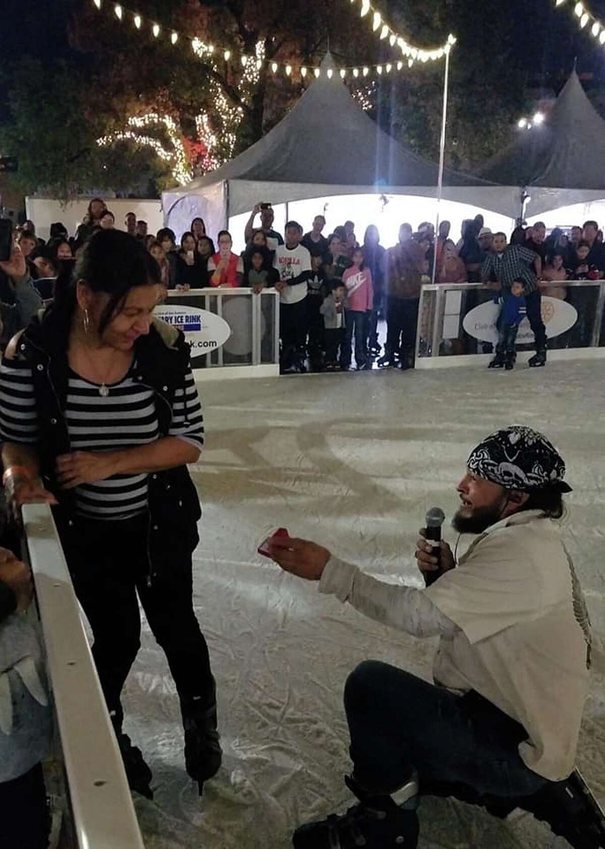 After being together for more than 11 years, Danny Torres, 43, proposed to his longtime girlfriend Chrissy Ruiz, 54, Sunday at the local outdoor ice skating rink that he helped build at Travis Park.
