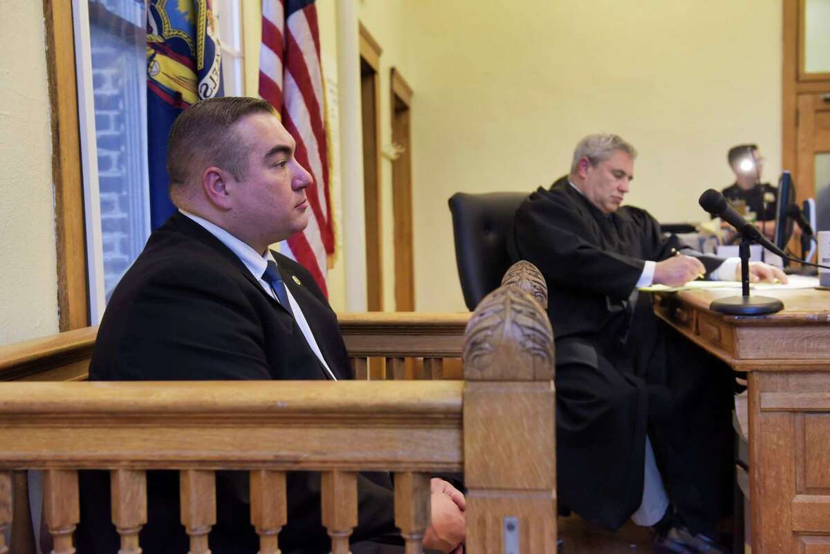 Cohoes Detective Michael Greene, left, testifies at a preliminary hearing for defendant, Anthony Ojeda, in the courtroom of Judge Thomas Marcelle on Monday, Dec. 9, 2019, in Cohoes, N.Y. (Paul Buckowski/Times Union)