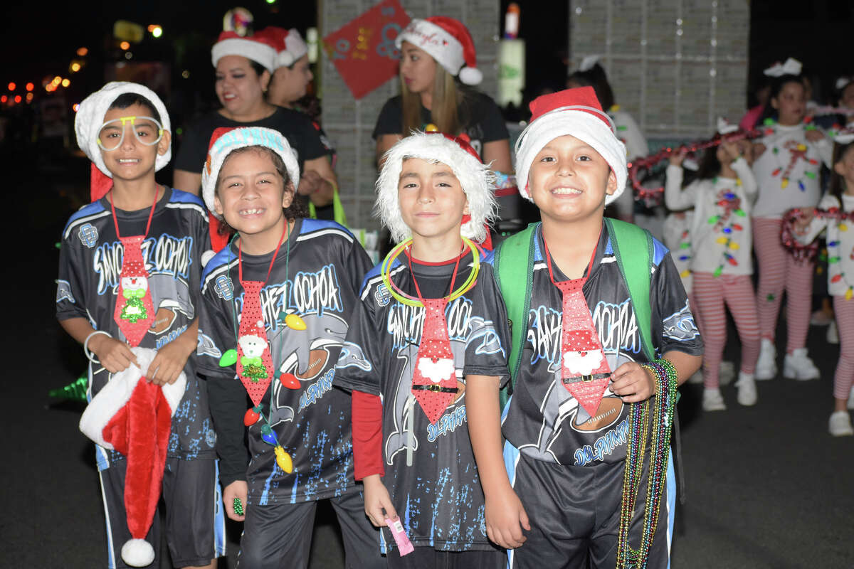 Laredoans begin the holiday spirit with the city's annual Christmas Parade.