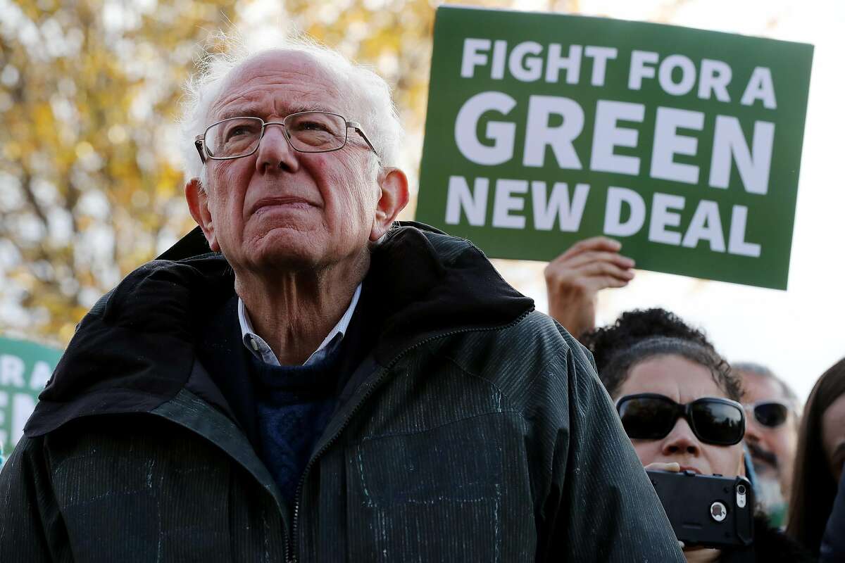 Democratic presidential candidate Sen. Bernie Sanders (I-VT) attends a news conference to introduce legislation to transform public housing as part of the Green New Deal outside the U.S. Capitol November 14, 2019 in Washington, DC. The liberal legislators invited affordable housing advocates and climate change activists to join them for the announcement.