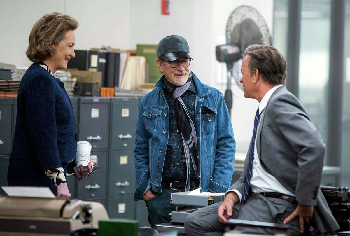This image released by 20th Century Fox shows actress Meryl Streep, from left, director Steven Spielberg, and actor Tom Hanks on the set of "The Post."