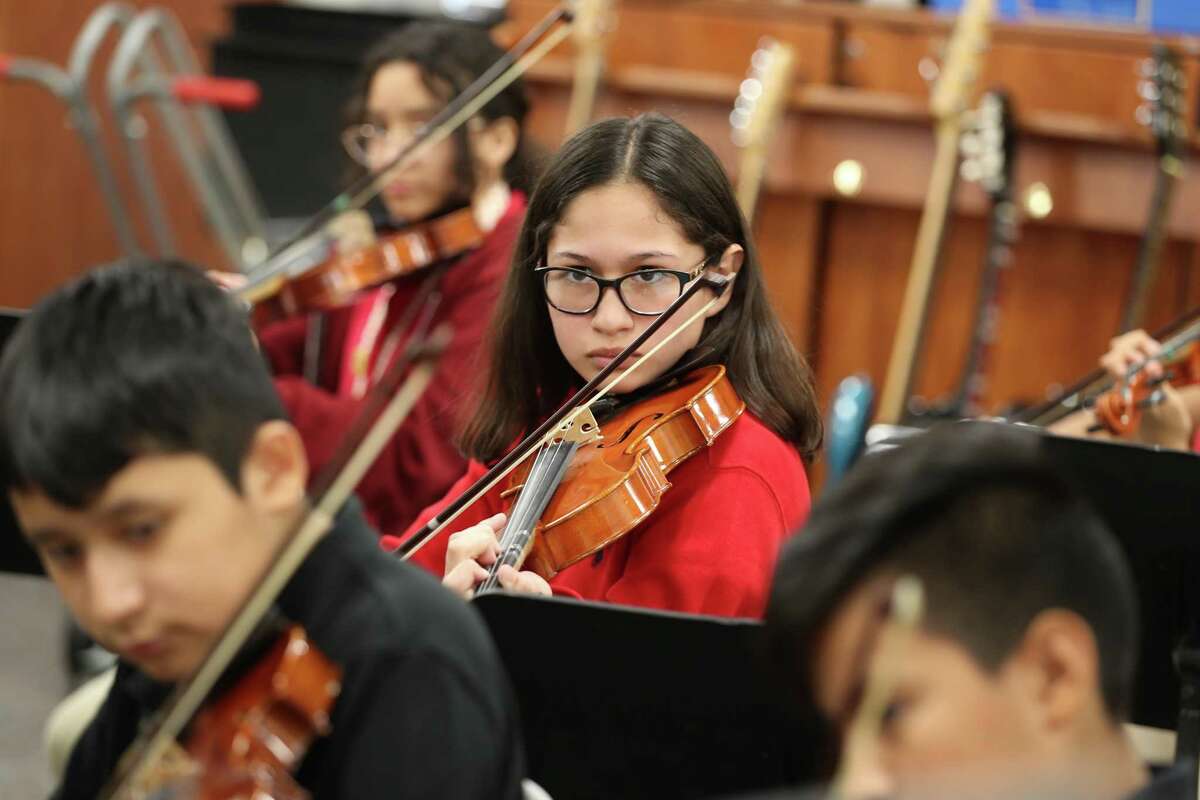 In this October file photo, Pilgrim Academy seventh-grader Avril Garcia practices in the school orchestra. Pilgrim’s enrollment increased by 65 students, or 5.7 percent from the previous year, among the largest jumps in Houston ISD in 2019-2020.