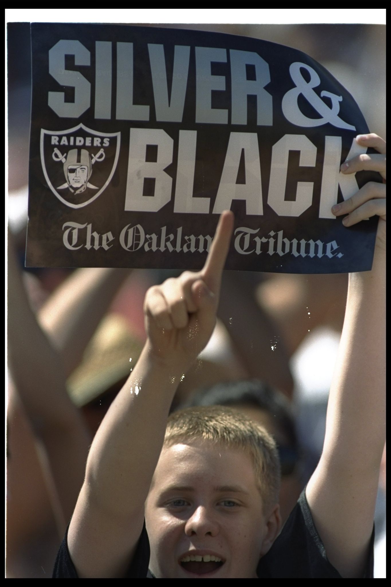 An NFL fan celebrates the return of the Raiders in this 1995 Oakland