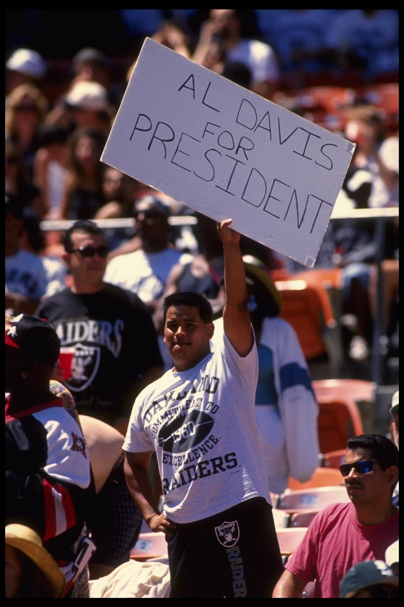 AFC playoffs, Closeup of painted Oakland Raiders fans in Black Hole