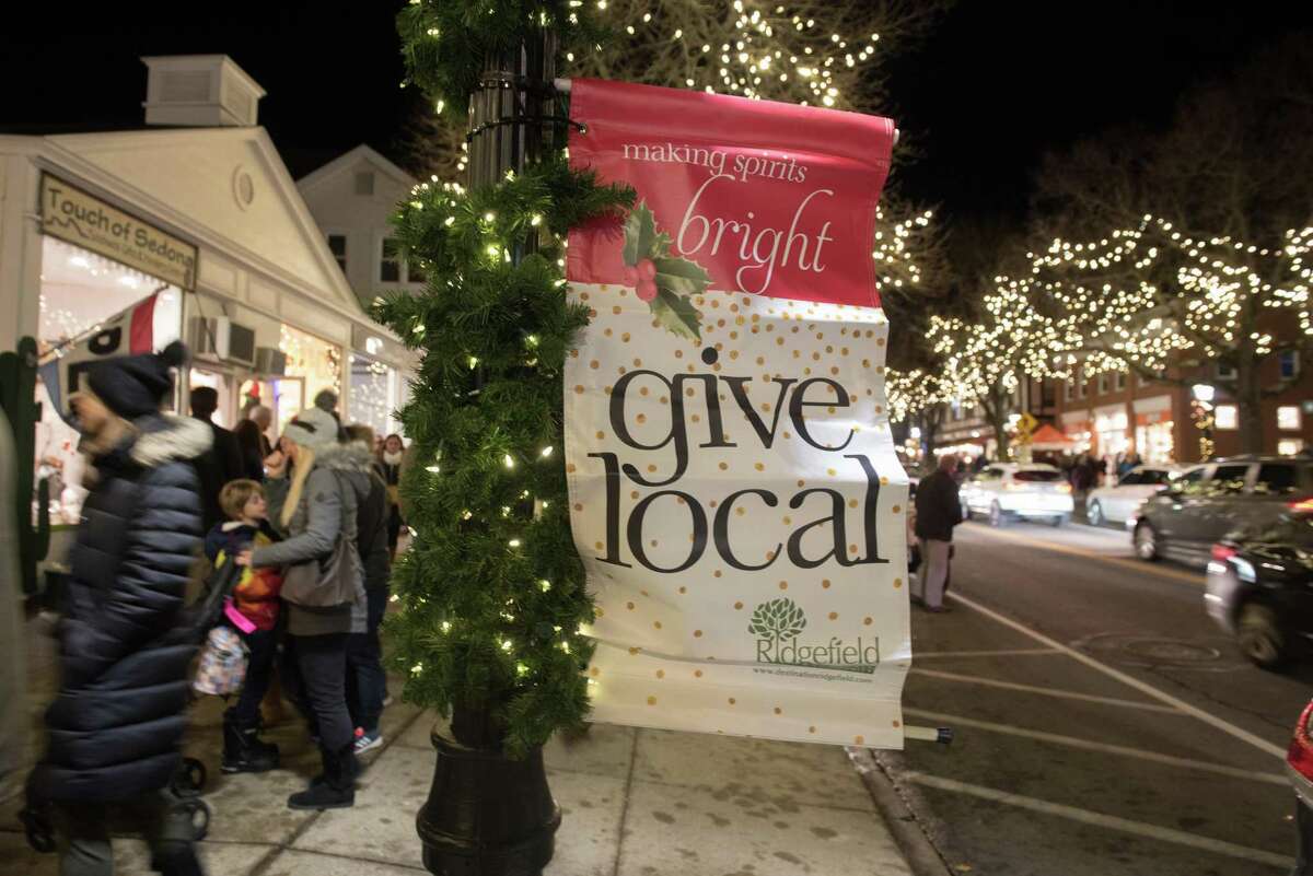 Ridgefield's Holiday Stroll offered visitors horse carriage rides, shopping, ice sculptures, a visit from Santa and plenty of holiday lights on Friday, Dec. 6, 2019.