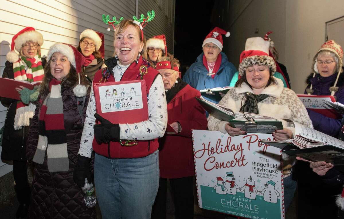 The Ridgefield Chorale carolled at the Ridgefield Holiday Stroll on Friday, Dec. 6, 2019 in Ridgefield.