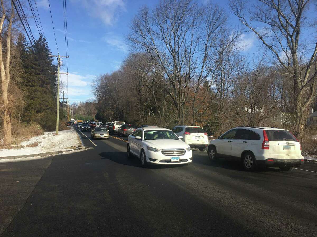 Traffic backs up near the exit of the Ridgefield Recreation Center on 195 Danbury Road on Thursday, Dec. 5.