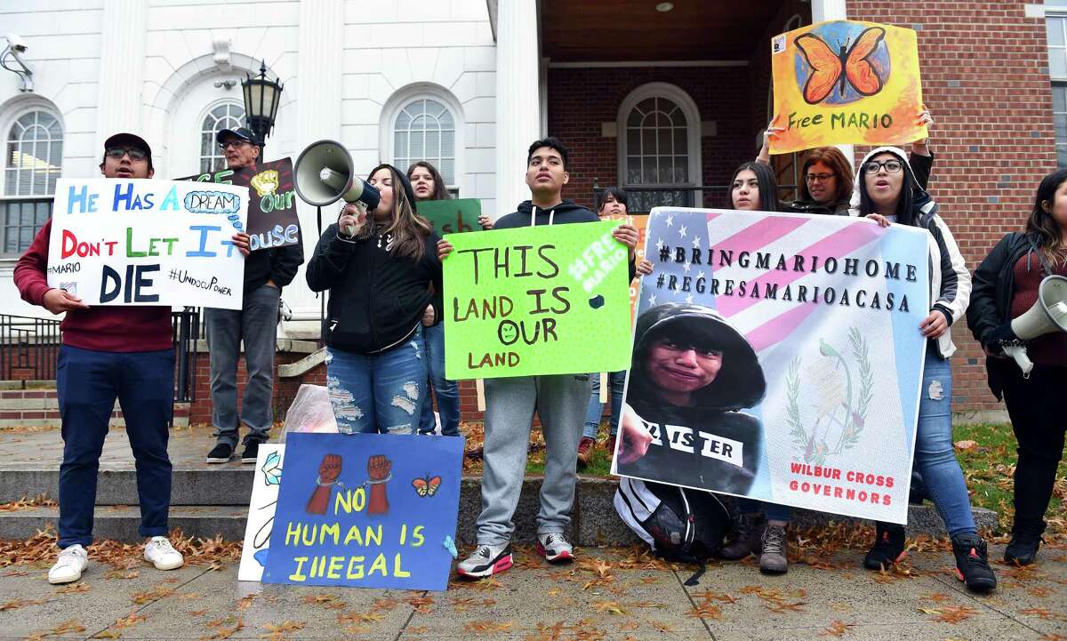 Wilbur Cross High School students, CT Students for a Dream and community members rally in front of Superior Court in Milford Tuesday to protest the detention of Wilbur Cross High School student Mario Aguilar Castanon by ICE.