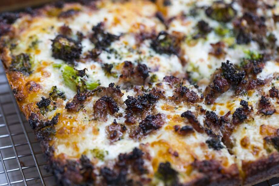 The mean green sausage machine is a deep dish pizza at Square Pie Guys in San Francisco, Calif. Square Pie Guys is a new Detroit-style pizza shop in SoMa owned by Marc Schechter and Danny Stoller. Photo: Brian Feulner / Special To The Chronicle 2019