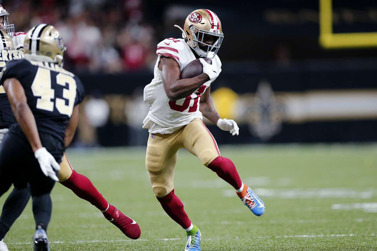 SSan Francisco 49ers running back Raheem Mostert (31) carries in the first half an NFL football game against the New Orleans Saints in New Orleans, Sunday, Dec. 8, 2019. (AP Photo/Brett Duke)
