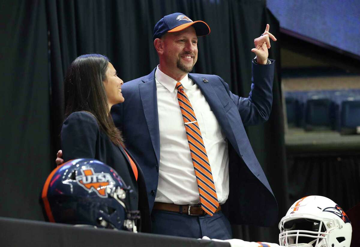 New UTSA head football coach, Jeff Traylor (right), is introduced by UTSA Vice President for Intercollegiate Athletics Lisa Campos (left) during a public announcement of Traylor's hiring at the Alamodome on Tuesday, Dec. 10, 2019. With introductions by UTSA President Dr. Taylor Eighmy and UTSA Vice President for Intercollegiate Athletics Lisa Campos, Traylor spoke with fervor about the path that led him to UTSA. With past and present players in the audience, Traylor also touched on his coaching philosophy and the steps he will take to help the Roadrunners succeed under his helm. Traylor is the third coach in the school's eighth year in collegiate football.
