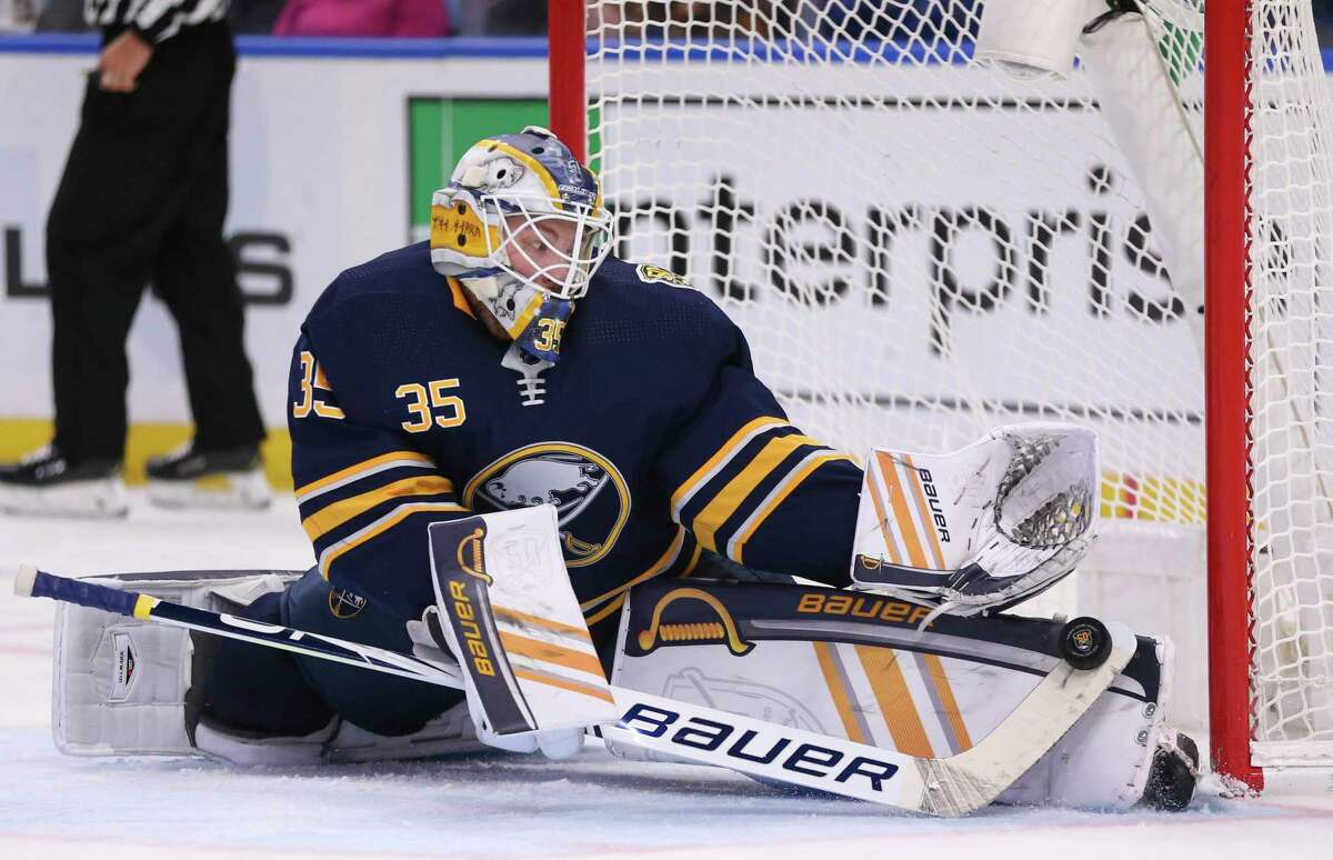 Buffalo Sabres goalie Linus Ullmark (35) makes a save during the second period of an NHL hockey game against the St. Louis Blues, Tuesday, Dec. 10, 2019, in Buffalo, N.Y. (AP Photo/Jeffrey T. Barnes)