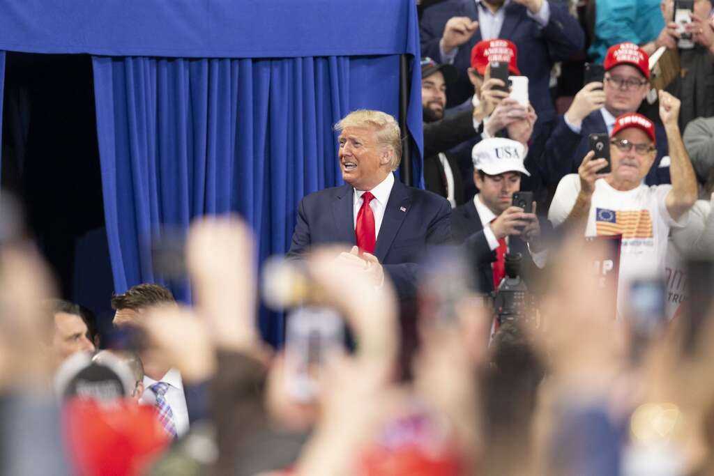 <p>HERSHEY, PA, USA - DECEMBER 10 : U.S. President Donald Trump speaks during a campaign rally on December 10, 2019 at Giant Center in Hershey, Pennsylvania, United States. (Photo by Lev Radin/Anadolu Agency via</p>