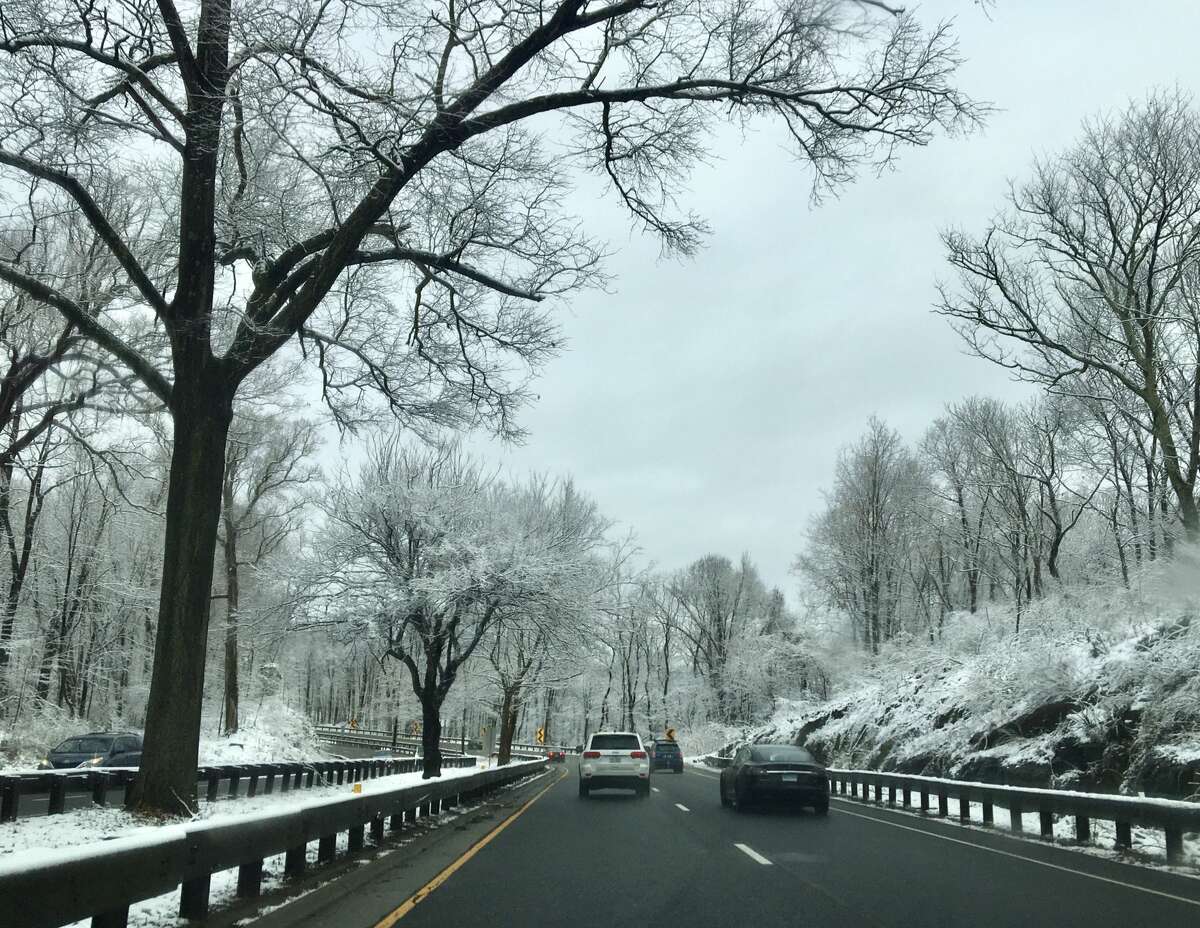 Snow along the Merritt Parkway on Wednesday, Dec. 11, 2019, in Greenwich, Connecticut.