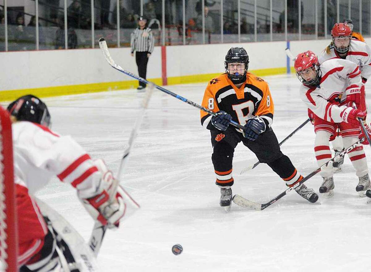 Emily Stefanelli takes a backhand shot in a game against Greenwich last season.
