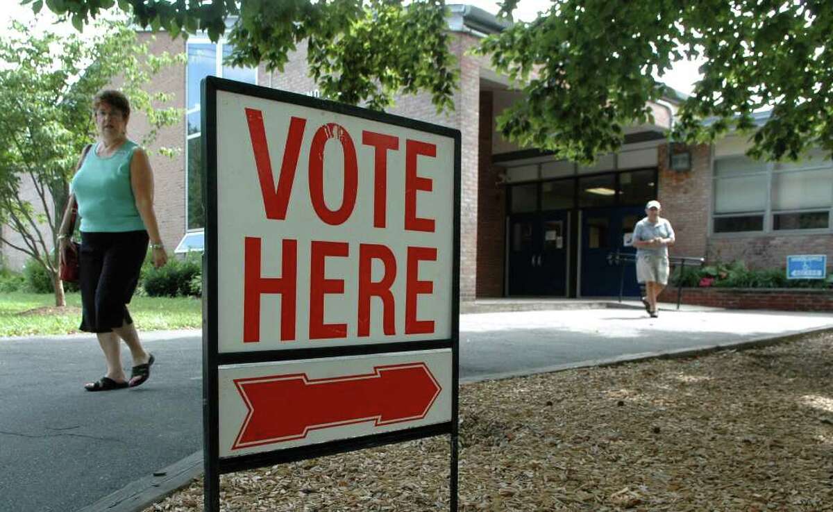 A slow trickle of voters arrive at Holland Hill School in Fairfield to cast their ballot for the candidate of their choice in the primary election on Tuesday August 10, 2010.