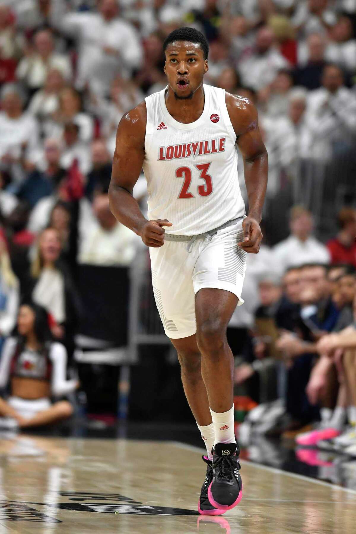 Mason Faulkner of the Louisville Cardinals brings the ball up court News  Photo - Getty Images