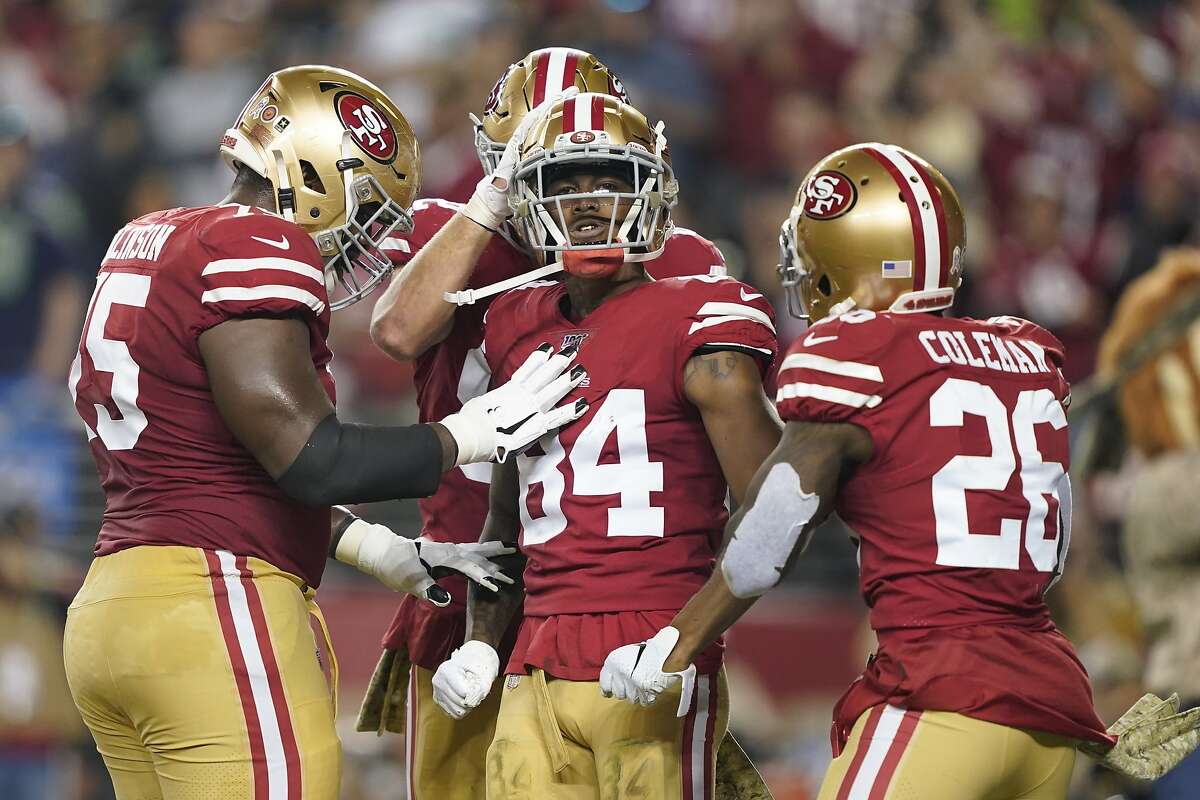 San Francisco 49ers Kendrick Bourne scores a touchdown as Los