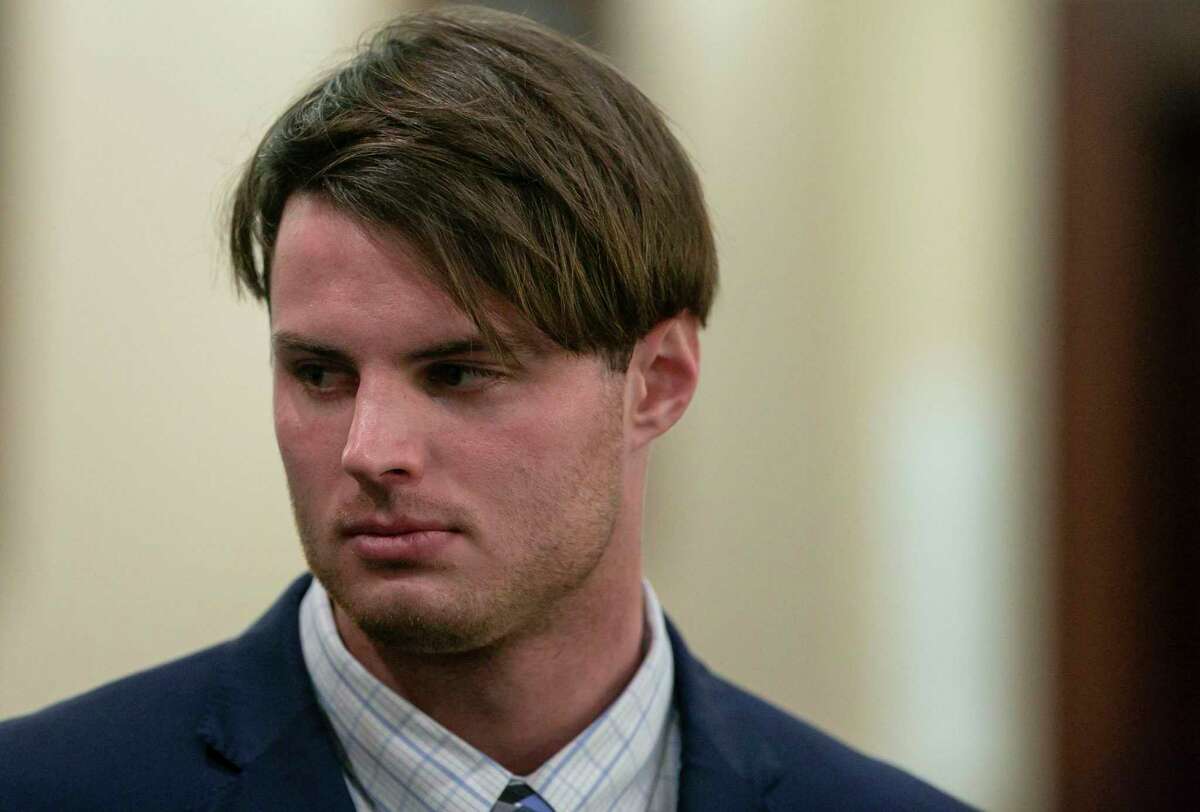 Mark Howerton, 24, accused in the death of his girlfriend, Cayley Mandadi, stands as the jury recessed for the day following deliberations on Wednesday, Dec. 11, 2019.