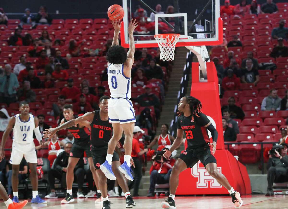 Texas-Arlington Mavericks guard Brian Warren Jr., (0) gets off a shot during the first half of an NCAA basketball game at Fertitta Center Wednesday, Dec. 11, 2019, in Houston.