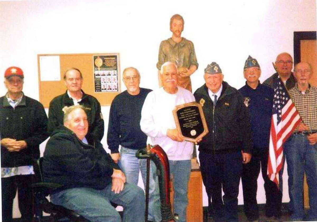 The Stephen T. Duchon Post No. 1847 Catholic War Veterans honored Bob Guenthardt the founder of the Tight Lines for Troops for his 10 years of service to the program. Shown (left to right) are post members Ron Showalter, Jerry Duchon, Shane Racine (in front), John Witkowski, Guenthardt, Post Commander Bob Gancarz, Mike Drake, Dan Korzeniewski and Dan Stefanski.