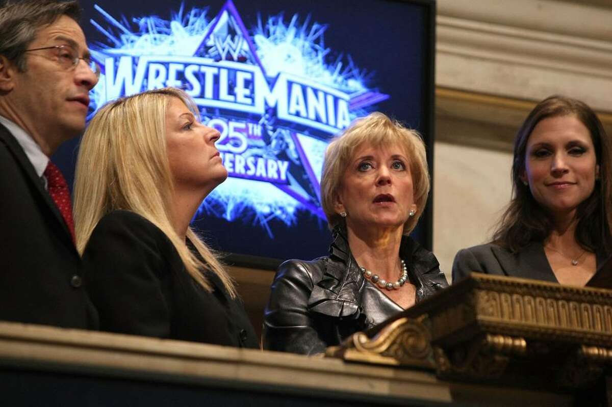 (L-R) EVP and COO, U.S. Products, NYSE Group, Lawrence Leibowitz, WWE Marketing EVP Michelle Wilson, WWE CEO Linda McMahon and WWE EVP of Creative Development and Operations, Stephanie McMahon Levesque ring the opening bell at the New York Stock Exchange on March 27, 2009 in New York City. (Photo by Michael Loccisano/Getty Images)