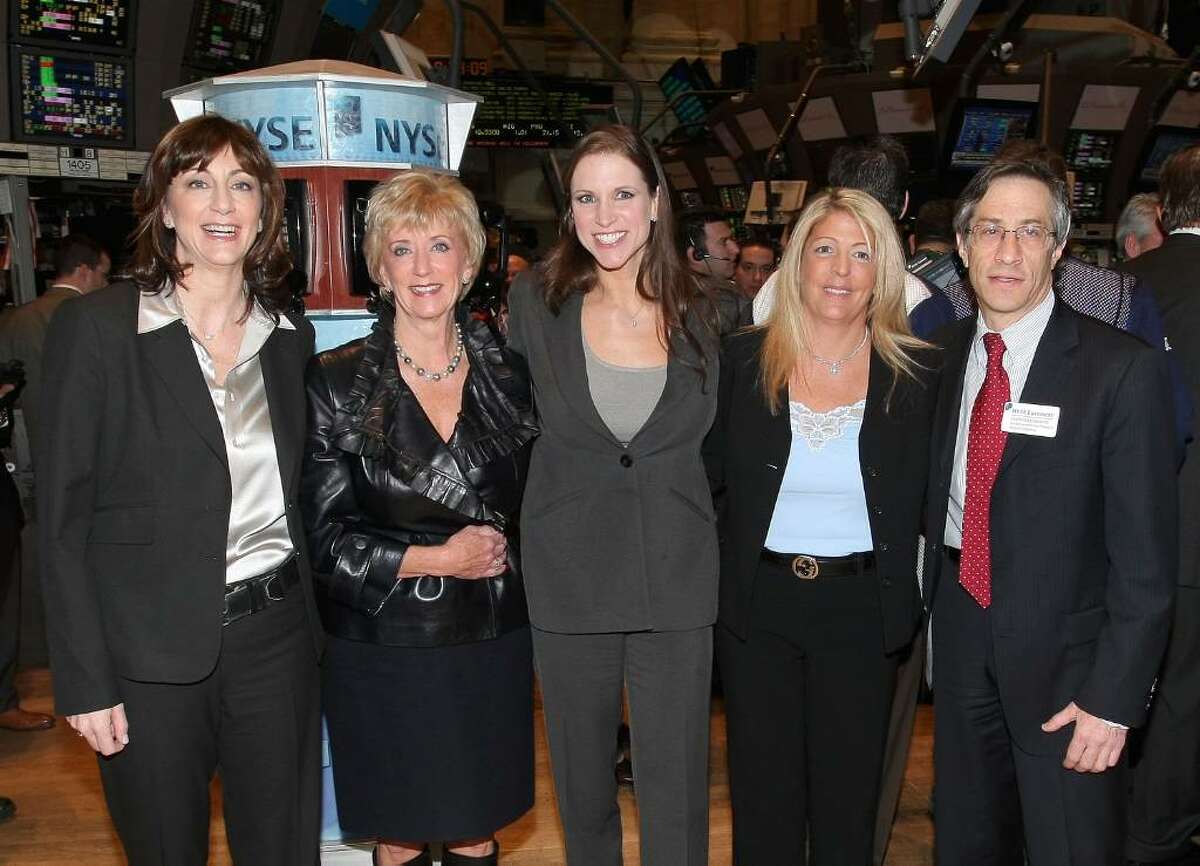 (L-R) WWE COO Donna Goldsmith, WWE CEO Linda McMahon, WWE EVP of Creative Development and Operations, Stephanie McMahon Levesque, WWE Marketing EVP Michelle Wilson and EVP and COO, U.S. Products, NYSE Group, Lawrence Leibowitz tour the floor after ringing the opening bell at the New York Stock Exchange on March 27, 2009 in New York City. (Photo by Michael Loccisano/Getty Images)
