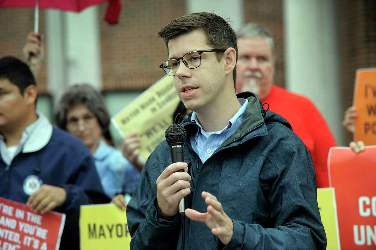David McGuire, executive director of the ACLU of Connecticut, speaks at an immigration rights rally in 2018.