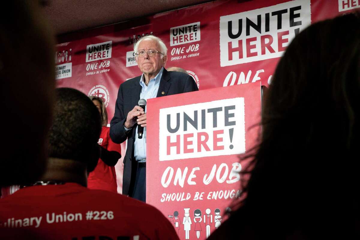 Democratic presidential candidate Sen. Bernie Sanders, I-Vt., reacts during a town hall meeting at the Culinary Workers Union Local 226 hosted by UNITE HERE, Tuesday, Dec. 10, 2019, in Las Vegas. Sanders, appearing before several hundred union workers in Las Vegas, explained his Medicare for All plan, which would switch the country to a government-run system and eliminate private health insurance. (Krystal Ramirez/Las Vegas Sun via AP)