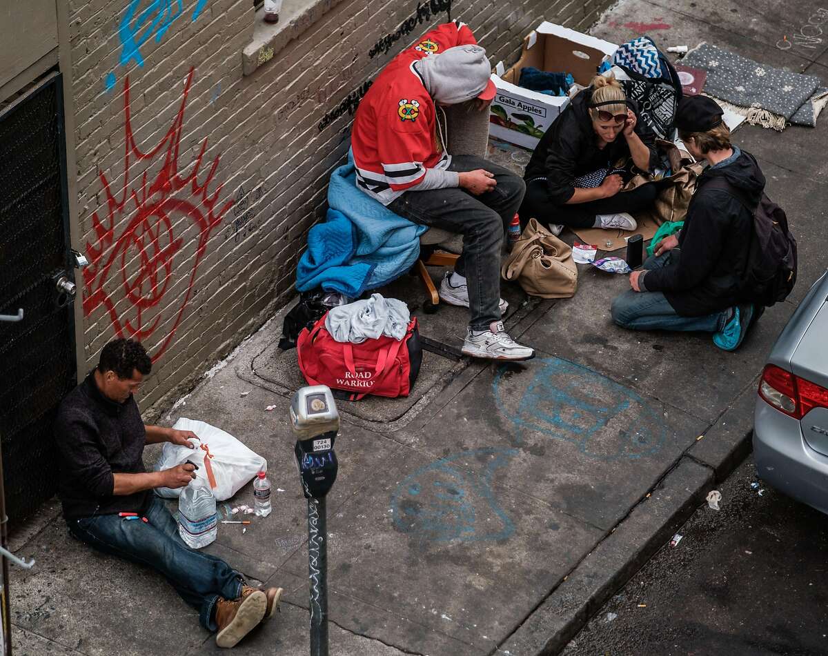 Drug users are seen on Willow Street, in San Francisco, Calif. on Thursday, October 16, 2019.