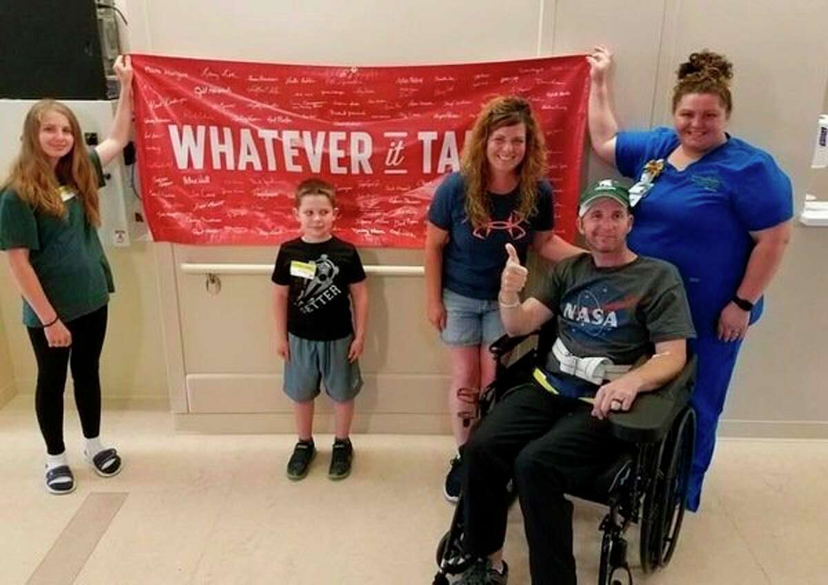 Matt Rorabaugh and his family as they take pride in their "Whatever it takes" attitude. According to Rorabaugh's wife, Theresa, she told her husband to do whatever it took to get back home to his family, after having suffered a stroke which left him paralyzed on the left side of his body. (Courtesy photo)