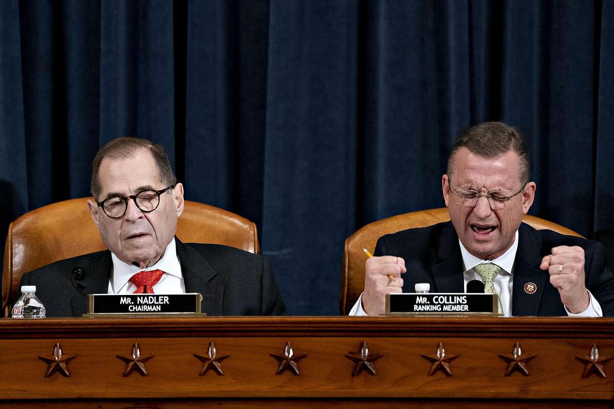 WASHINGTON, DC - DECEMBER 12: Ranking member Rep. Doug Collins (R-GA) (R) speaks as House Judiciary Committee Chairman Jerry Nadler (D-NY) listens during a House Judiciary Committee markup hearing on the Articles of Impeachment against President Donald Trump at the Longworth House Office Building on Thursday December 12, 2019 in Washington, DC. The articles of impeachment charge Trump with abuse of power and obstruction of Congress. House Democrats claim that Trump posed a 'clear and present danger' to national security and the 2020 election in his dealings with Ukraine over the past year. (Photo by Andrew Harrer - Pool/Getty Images) *** BESTPIX ***
