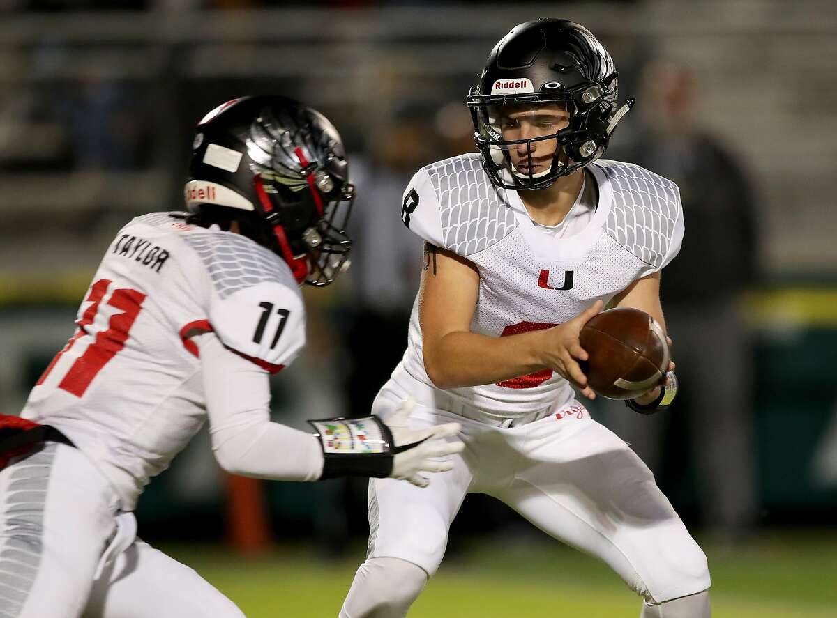 Quarterback Jake Kern (8) and running back Omari Taylor (11) will try to help Clayton Valley-Concord beat Aquinas-San Bernardino for the school's first state title.